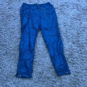 Adidas teal nylon pants, size medium